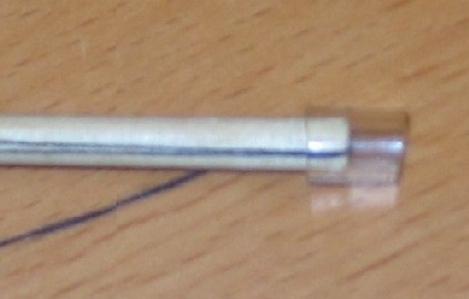 flute and whistle swab other end securing dental floss